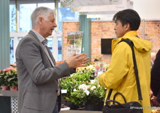 Poul Graff of Graff talking with a visitor.